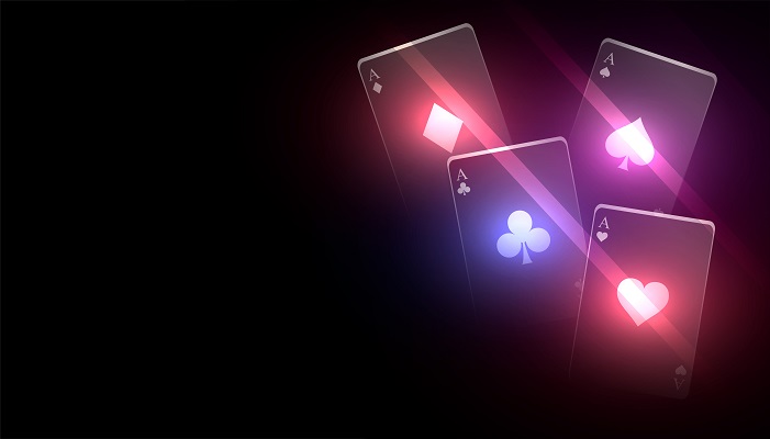 Glowing playing cards on a black background